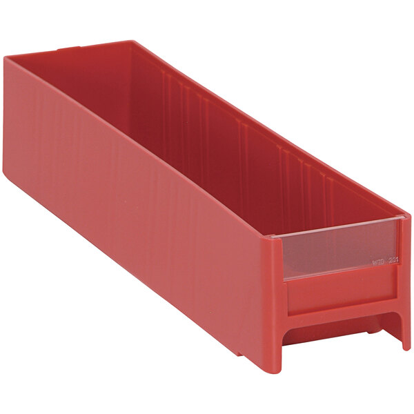 A red plastic drawer for industrial storage.