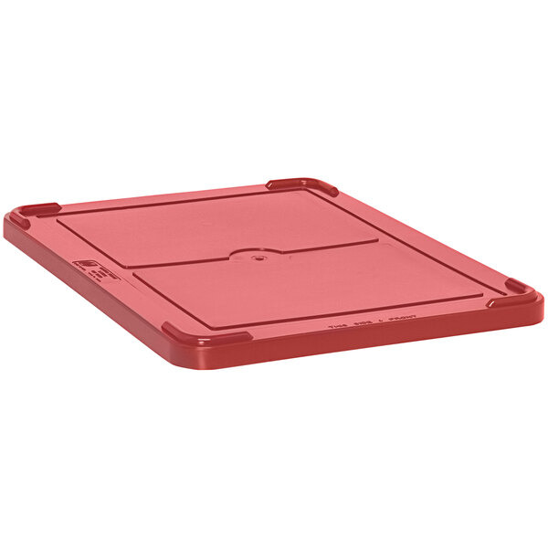 A Quantum red lid for dividable grid containers on a table.