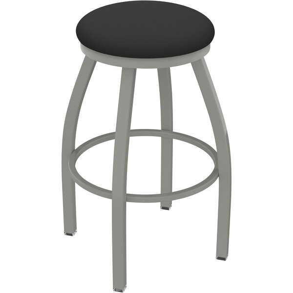 A Holland Bar Stool restaurant bar stool with a black seat and anodized nickel finish.