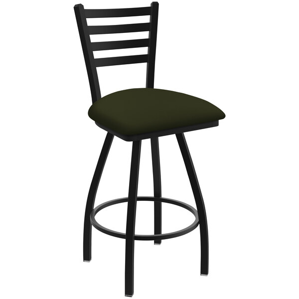 A black Holland Bar Stool ladderback swivel bar stool with a green pine seat.