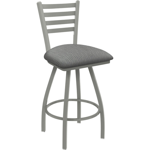 A Holland Bar Stool Jackie ladderback counter stool with a gray cushion.