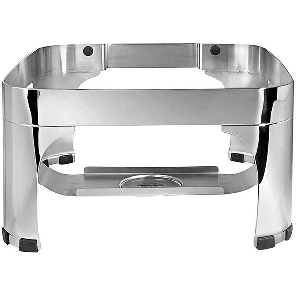 A Spring USA stainless steel chafer stand with black rubber feet.