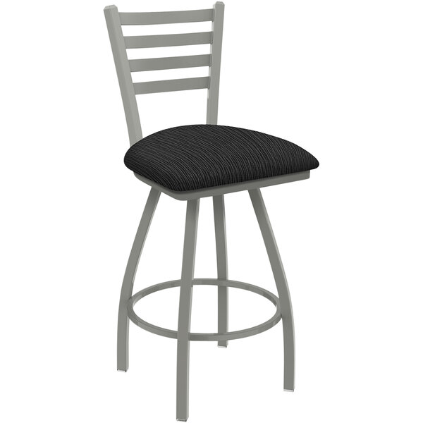 A Holland Bar Stool Jackie Ladderback swivel bar stool with a black seat.