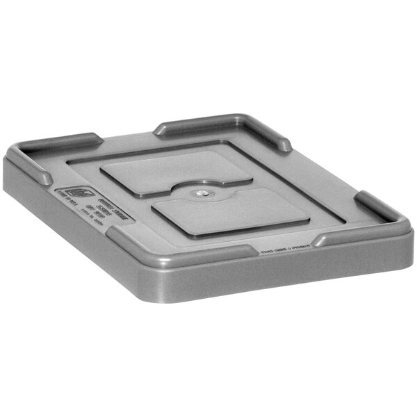 A Quantum gray plastic container lid on top of a gray plastic container.