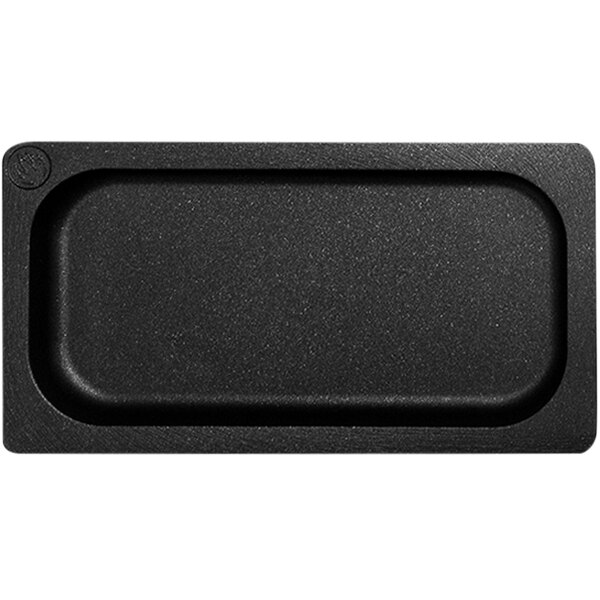 A black rectangular Mibrasa roasting tray with a white border.