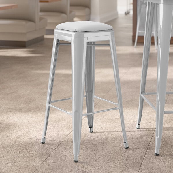 Lancaster Table & Seating Alloy Series Silver Indoor Backless Barstool with White Vinyl Cushion
