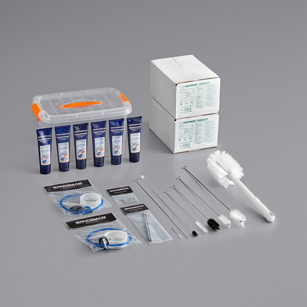 A Spaceman starter kit with white brushes and other items.