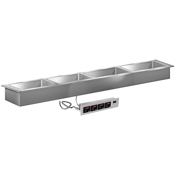 A stainless steel LTI Slimline 4 well drop-in hot food well on a counter.