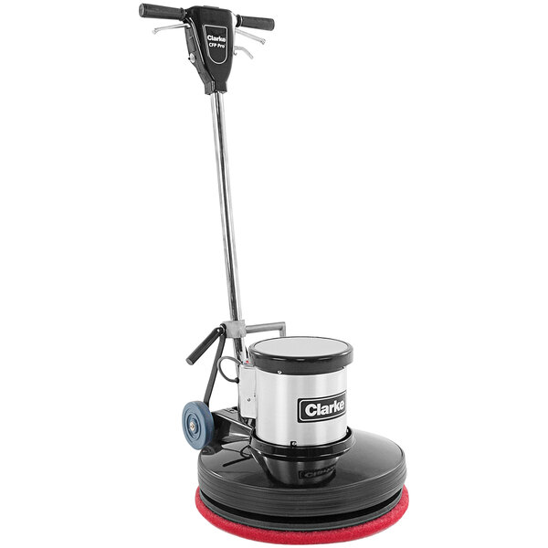 A Clarke 20DS CFP PRO floor machine with a red and black base and a handle.
