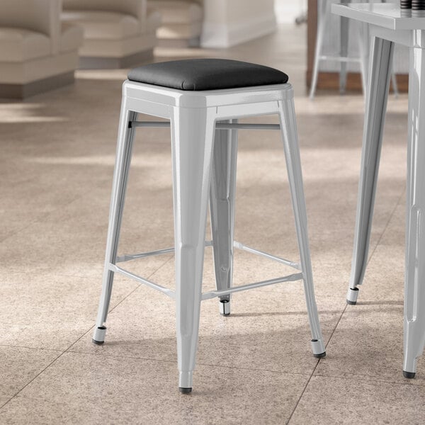 Lancaster Table & Seating Alloy Series Silver Indoor Backless Counter Height Stool with Black Vinyl Cushion