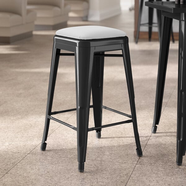 Lancaster Table & Seating Alloy Series Black Indoor Backless Counter Height Stool with White Vinyl Cushion