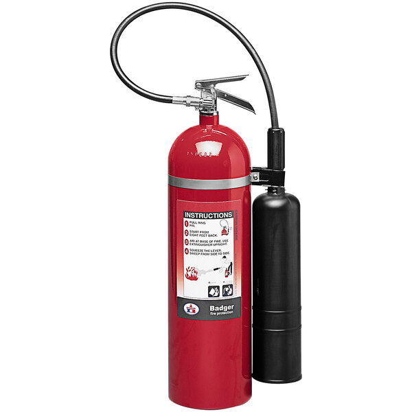 A red Badger fire extinguisher with a black cylinder and instructions.