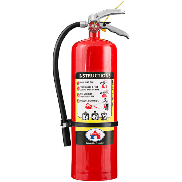A red Badger fire extinguisher with black hose and Spanish instructions.