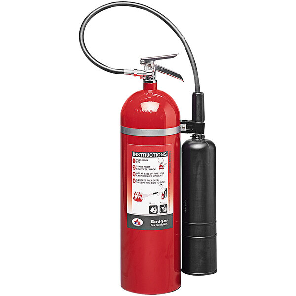 A red Badger fire extinguisher with black accents and Spanish instructions.