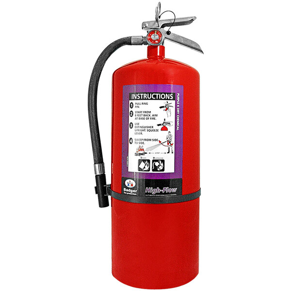A red Badger fire extinguisher with a black hose.