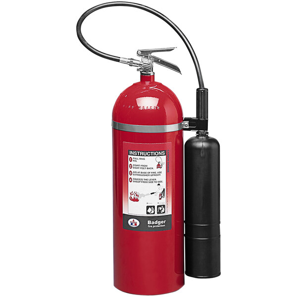 A red Badger fire extinguisher with a black cylinder.