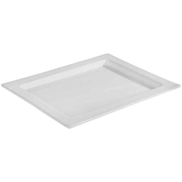 A white rectangular porcelain tray with a handle.