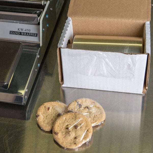 A cookie wrapped in Western Plastics perforated film on a counter.