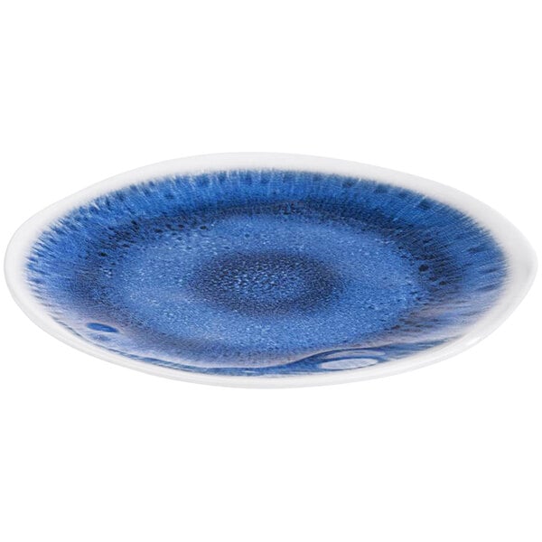 A blue plate with a white circular design.
