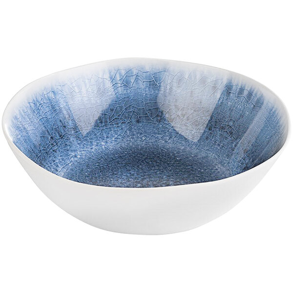A blue melamine bowl with a crackled surface and white speckles.