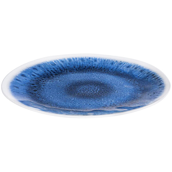 A blue oval melamine serving tray with a white swirl design.