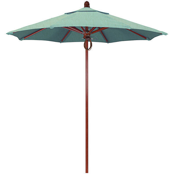 A blue California Umbrella with a spa fabric canopy on a white background.