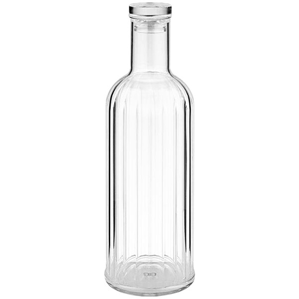 A clear plastic ribbed bottle with a white lid.