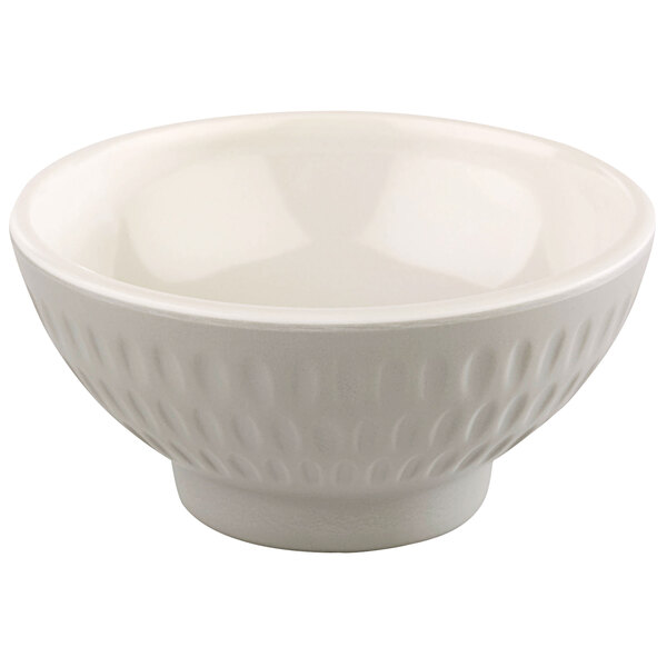 A cream melamine bowl with a textured pattern.