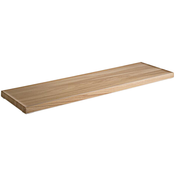 An APS rectangular melamine serving tray on a wooden surface with a white background.