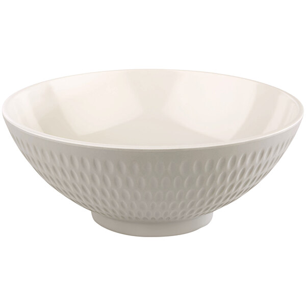 A white bowl with a textured pattern.