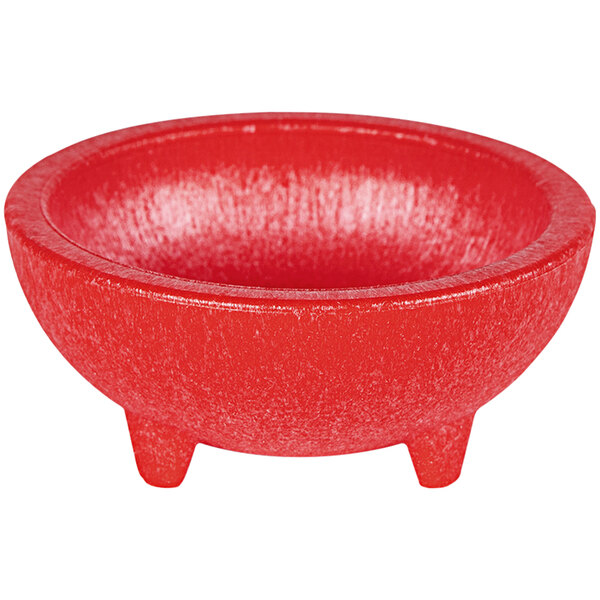 A red HS Inc. Polypropylene Chico Molcajete bowl with three legs.