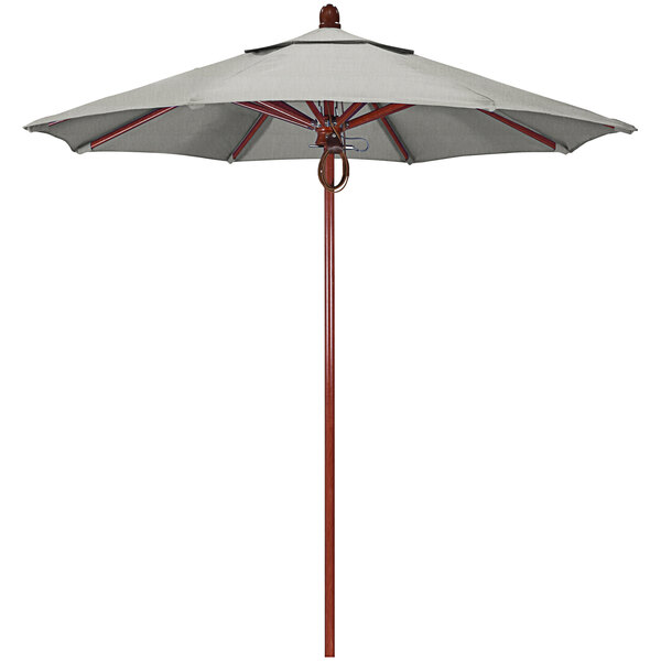 A California Umbrella with a granite grey canopy and a red oak pole.