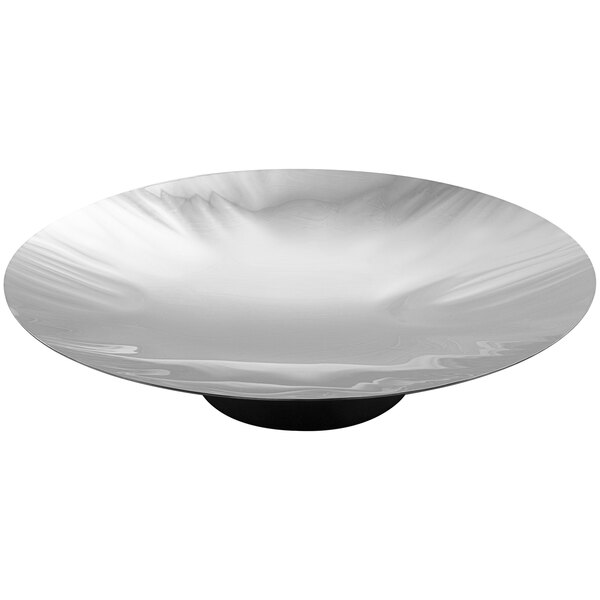 A stainless steel round platter with a black base.