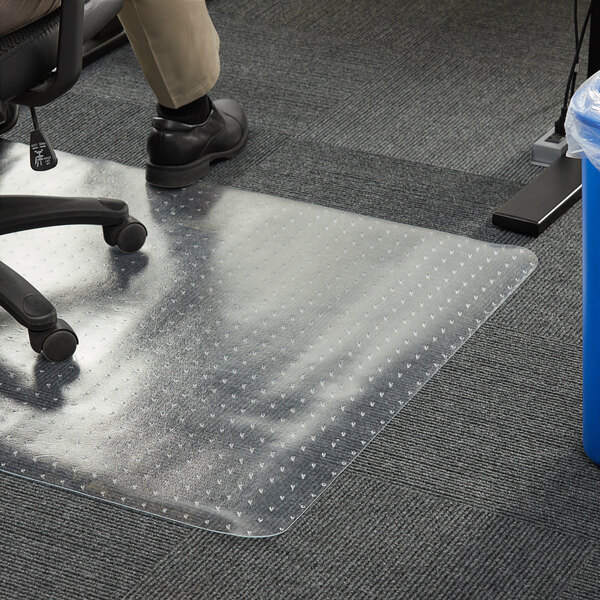 A 36" x 48" clear 360 Office Furniture chair mat on a carpet.
