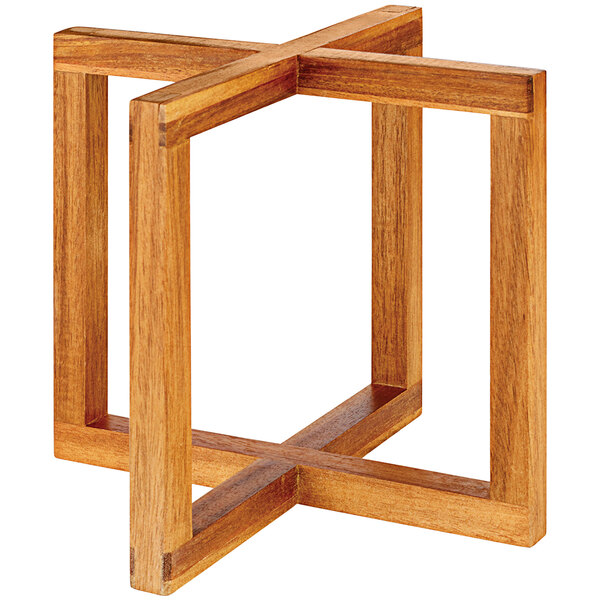 A light wood cube display stand with four open sides.