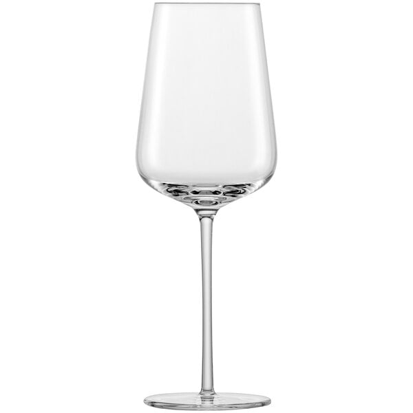 A close-up of a clear Schott Zwiesel Verbelle Sauvignon Blanc wine glass with a long stem.