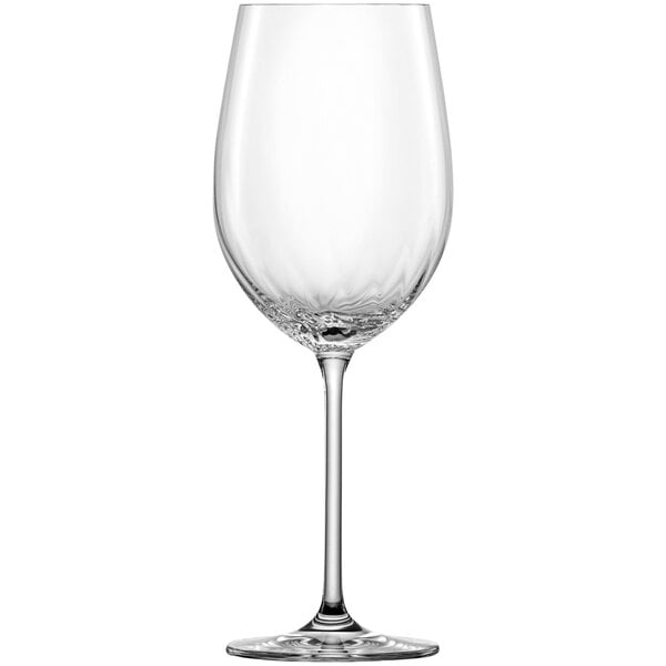 A clear Schott Zwiesel wine glass with a stem.