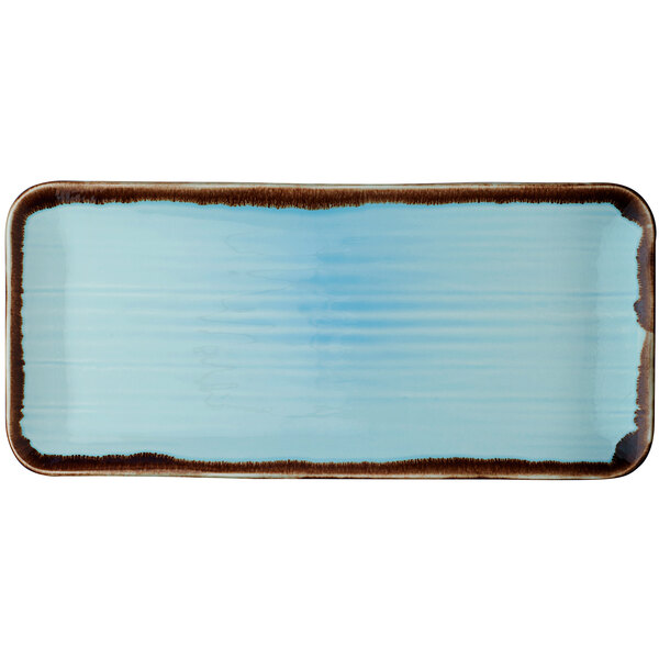 A rectangular turquoise china platter with blue and brown stripes.