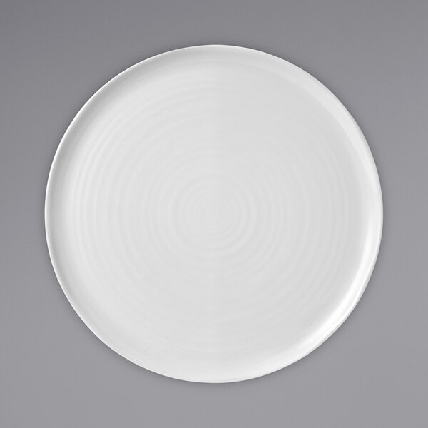 A Dudson white china plate with a spiral design.
