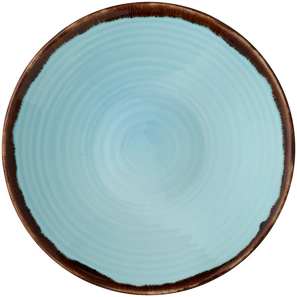 A turquoise Dudson coupe bowl with a brown rim.