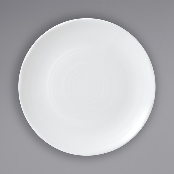 A Dudson Organic White china plate with a circular rim.