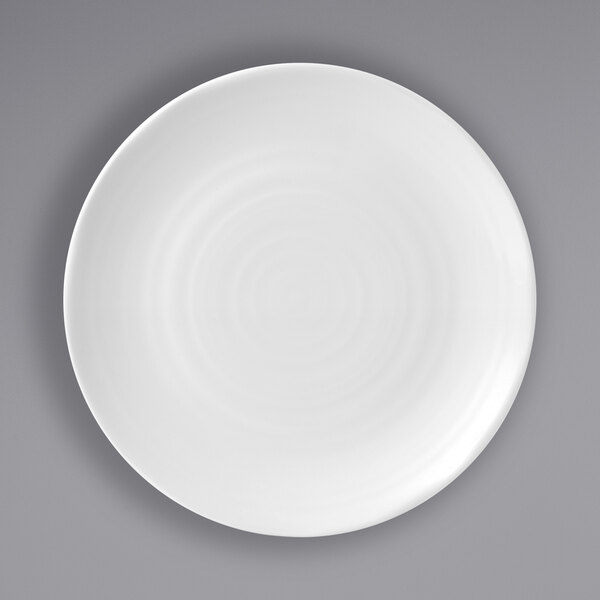 A white Dudson Organic china plate with a circular rim.