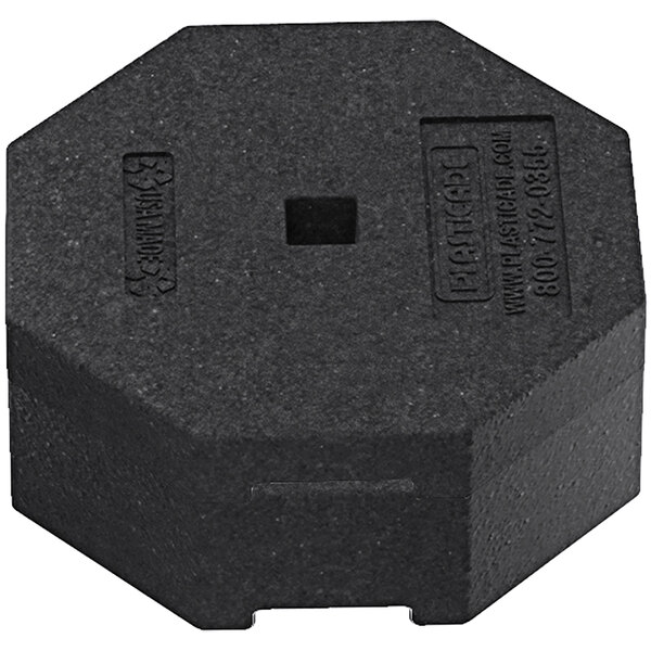 A black rectangular rubber base with a square hole in it.