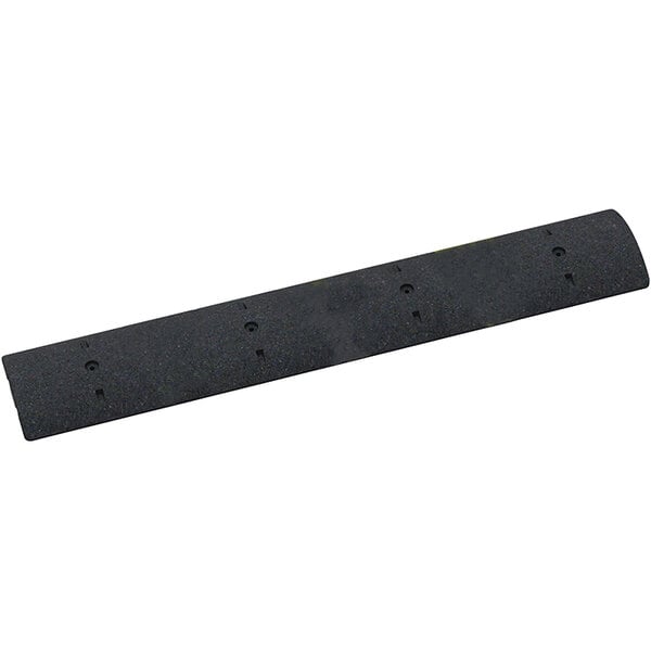 A black Plasticade rubber speed bump with holes.
