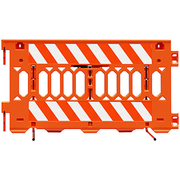 An orange Plasticade barricade with white stripes on one side.