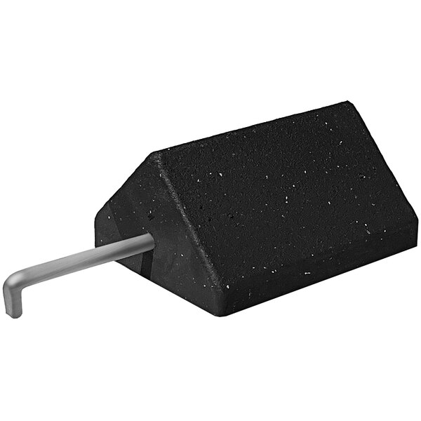 A black block with a galvanized metal rod.