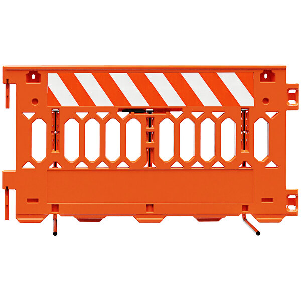 An orange and white Plasticade Pathcade parade barricade with engineer grade white striped sheeting on one side.