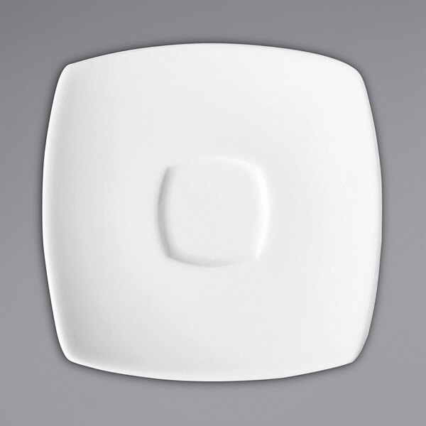 A bright white square porcelain saucer with a square center.