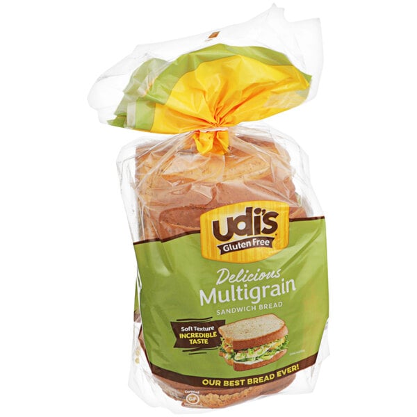 A bag of Udi's Gluten-Free Delicious Multigrain Sandwich Bread with a green and yellow label.