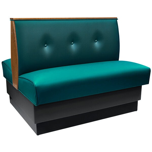 An American Tables & Seating forest green booth with a tufted back and end caps.